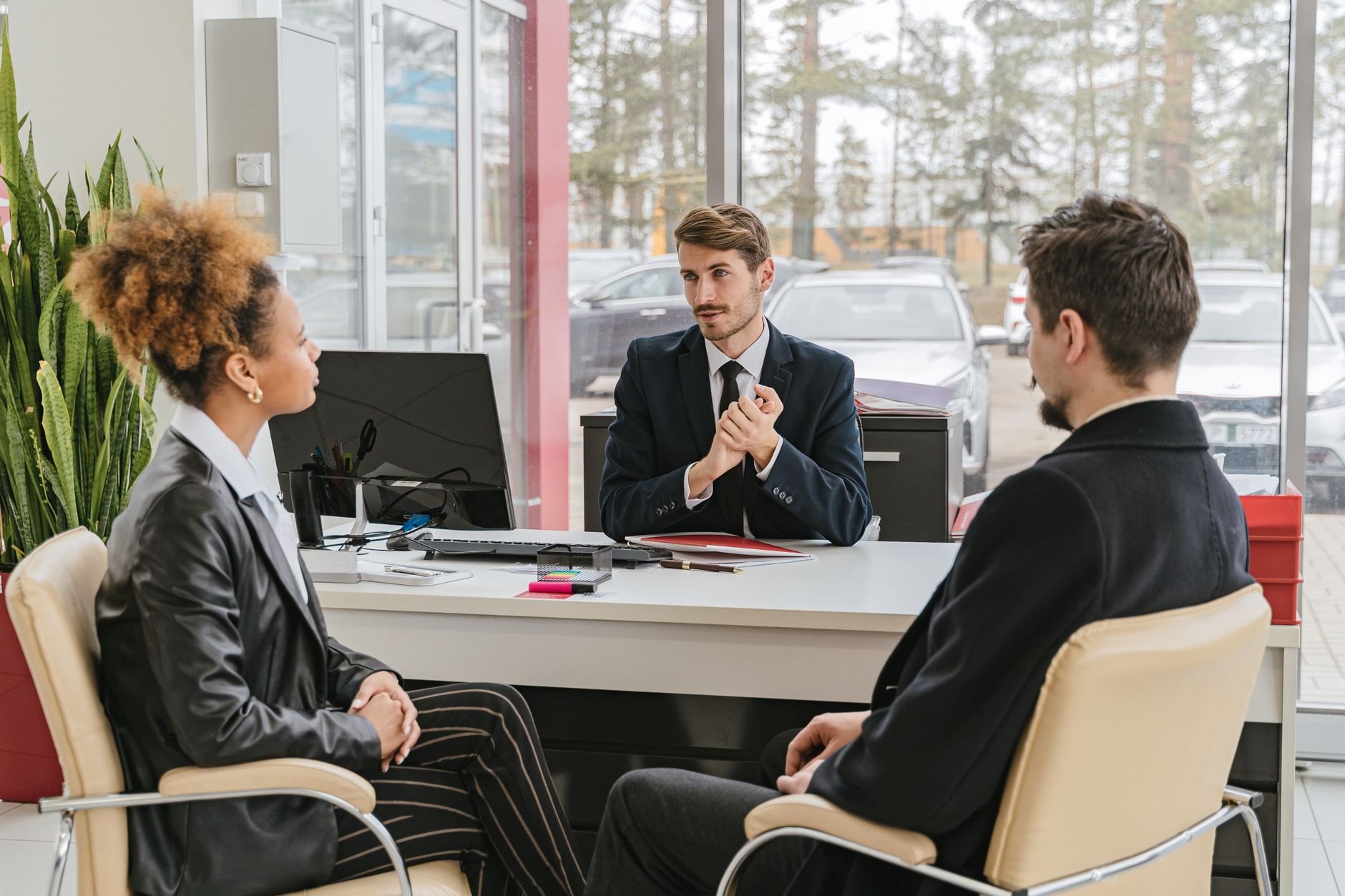 Professional consulting meeting with automotive advisor and client